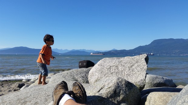 a boy a stone and water