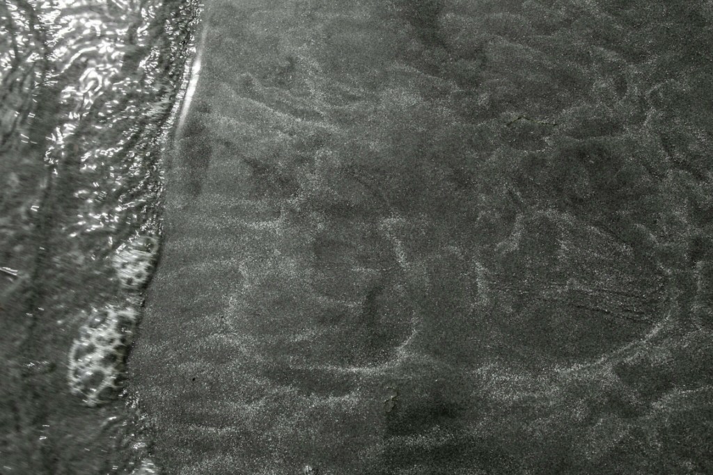 Footprints in the sand, Chesterman Beach, Tofino, British Columbia, Canada