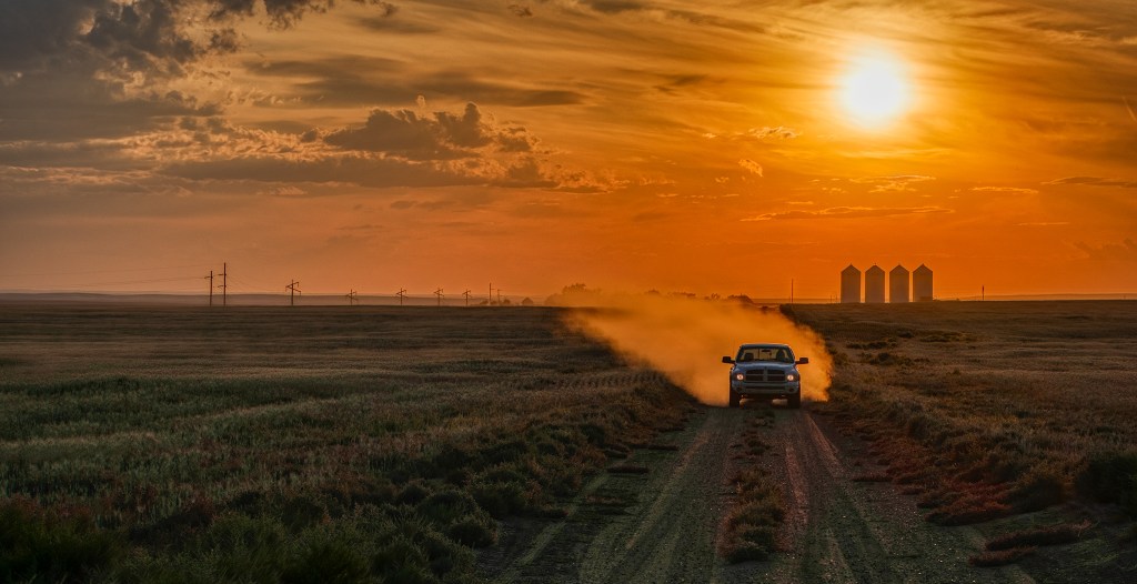 Dusty Tail and Pickup Truck, Empress, Alberta, Canada