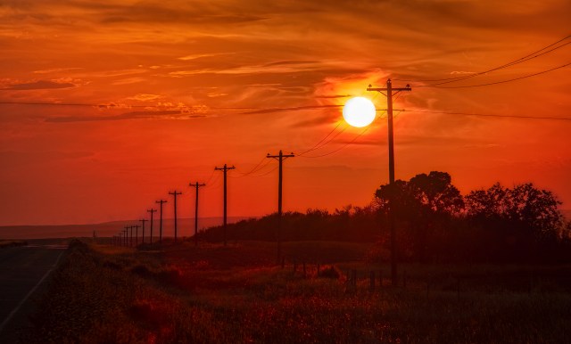 Orb in a Red Sky, Highway 555, Bindloss, Alberta, Canada